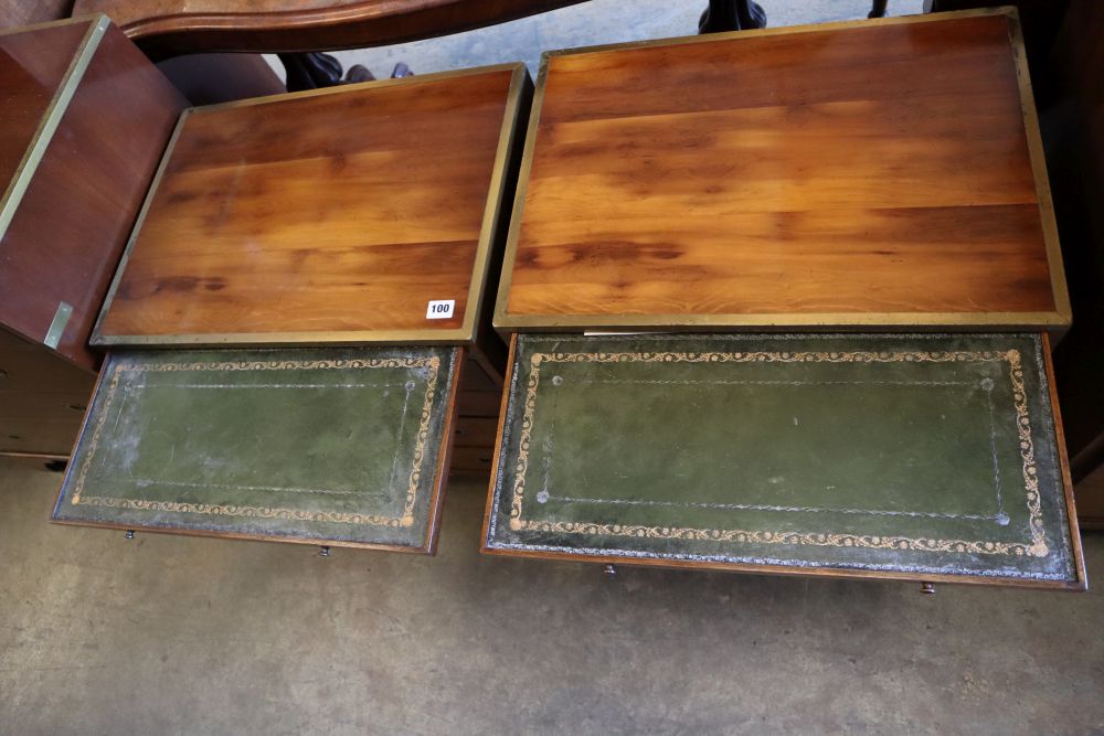 A pair of brass mounted yew wood campaign style chests, each with brushing slide, two short and three graduated long drawers, width 56c